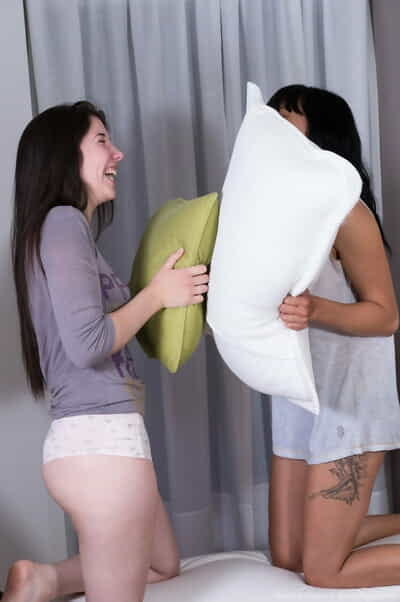 Black haired teens Fanny and..